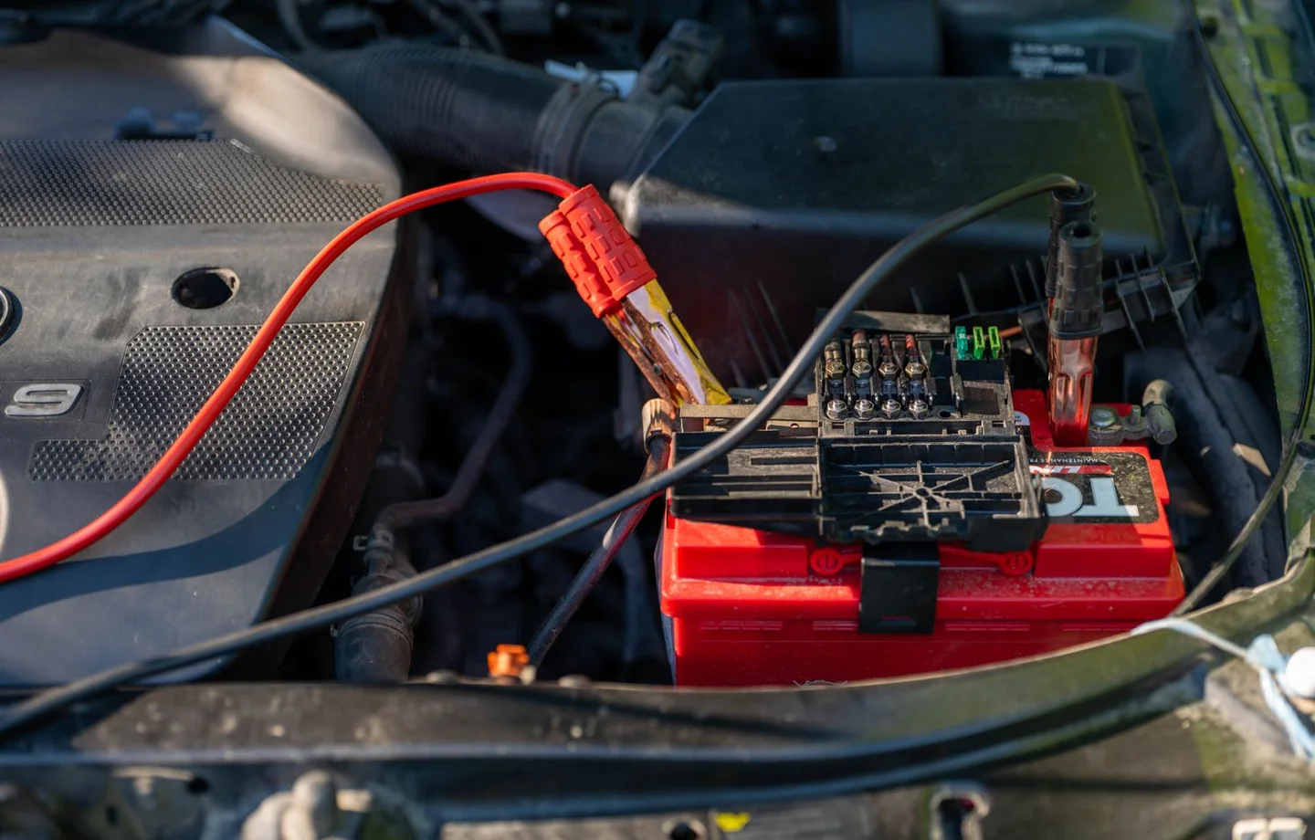 Car battery and jumper cable connections