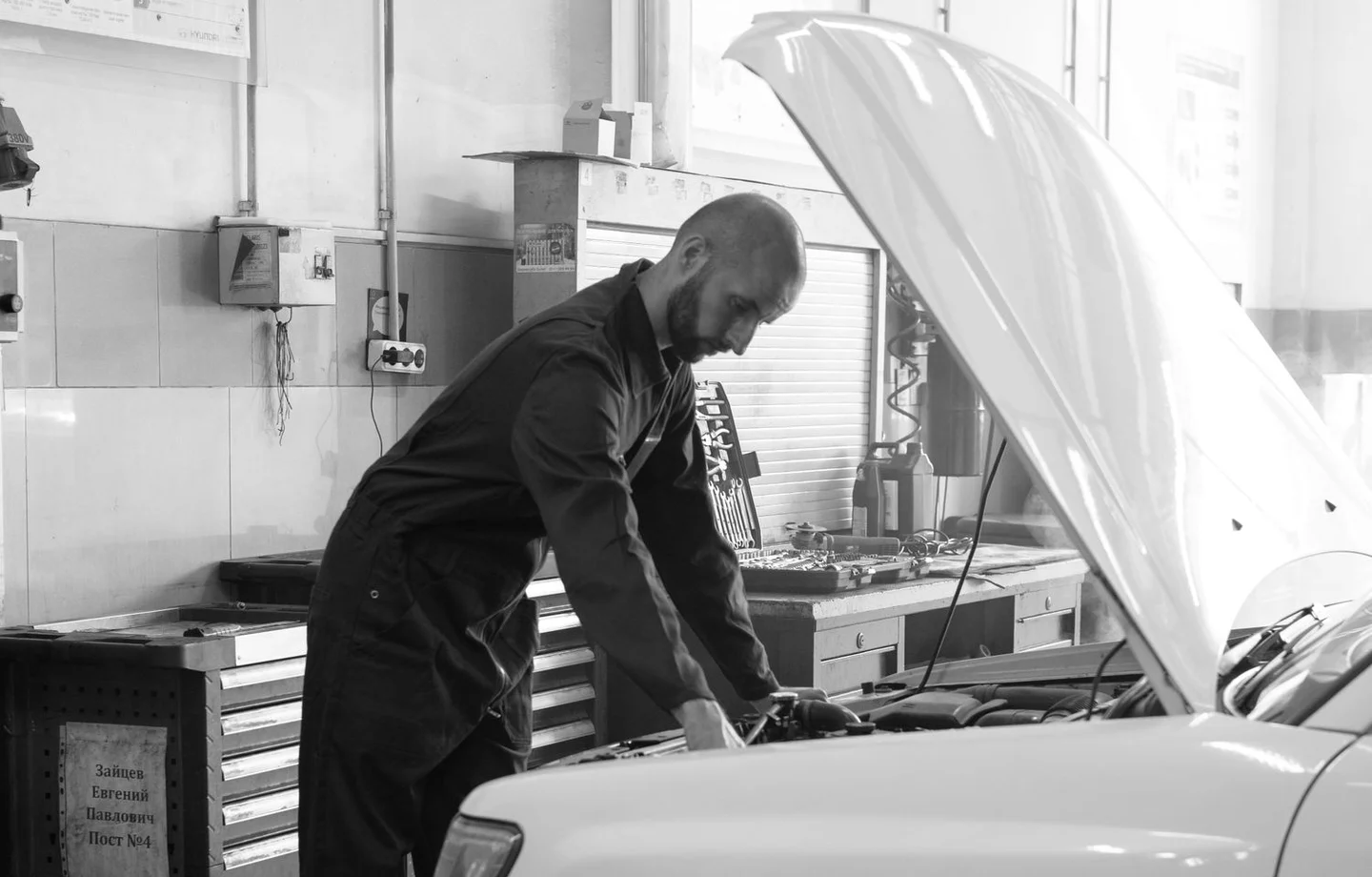 Mechanic working on vehicle maintenance