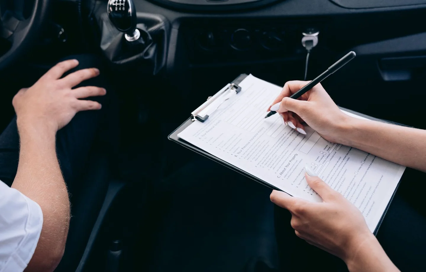 Vehicle paperwork on a clipboard