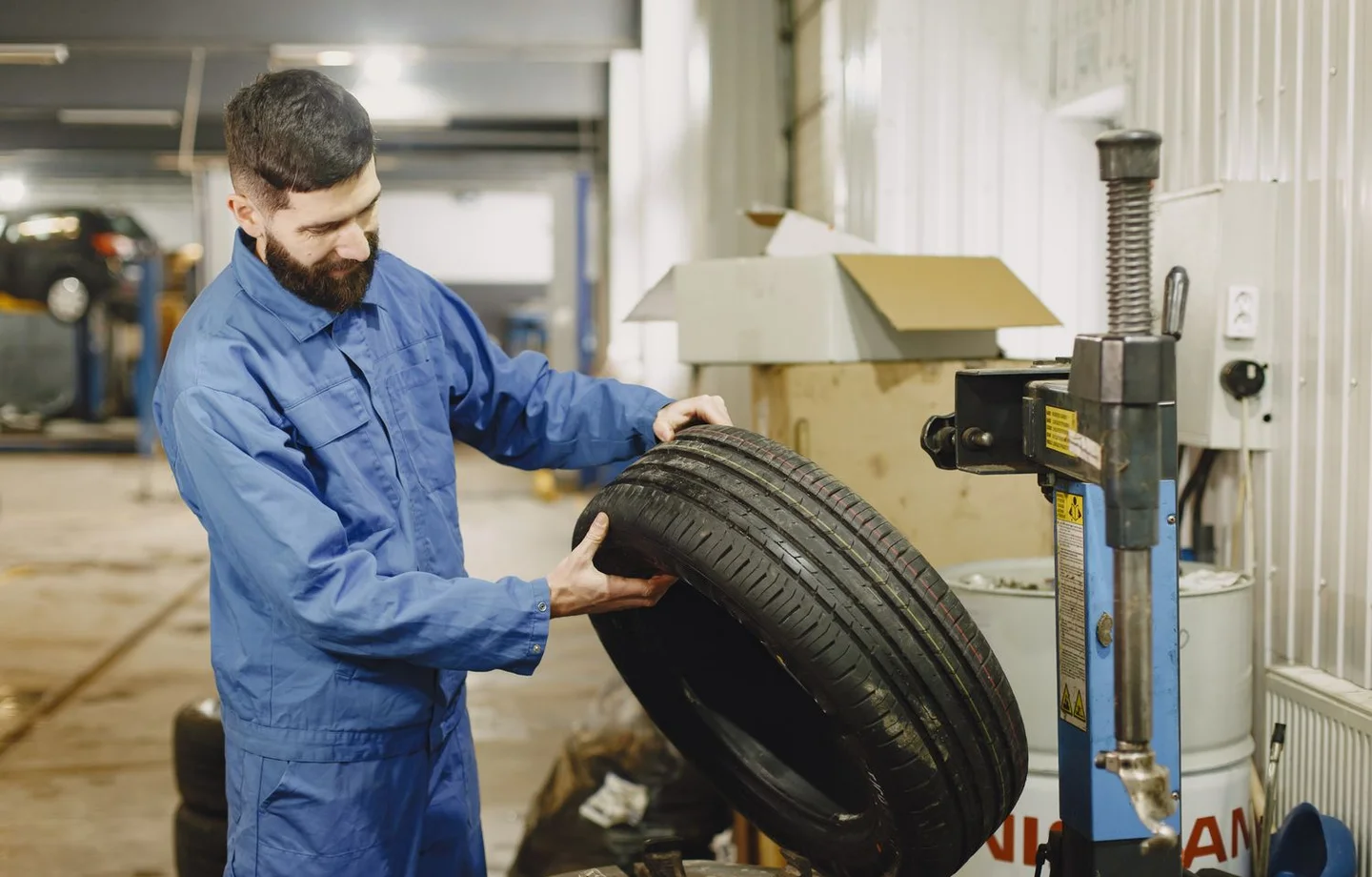 Mechanic examining a tyre